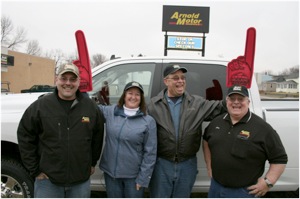 L to R: Jason Madison, Arnold Motor Supply salesperson, Joni and Greg Meckley, the happy winners, and Jerry Bachman Arnold Motor Supply store manager. Meckley Parts and Service of Melbourne, Iowa, a customer of The Merrill Co., wins a Ram 1500 Pickup Truck.