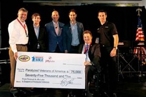 (from left to right) Rusty Barron (vice president of marketing, Pennzoil), Ryan Blaney (NASCAR Xfinity Series Driver of the No. 22 Discount Tire Ford Mustang), Jonathan Gibson (Team Penske vice president of marketing communication), Joey Logano (NASCAR Sprint Cup Series Driver of the No. 22 Shell Pennzoil Ford Fusion), Al Kovach (PVA National President) and Simon Pagenaud (Verizon Indycar Series of the No. 22 Dalara/Chevrolet) all came together for the presentation of a $75,000 check to Paralyzed Veterans of America from Pennzoil and Jiffy Lube.