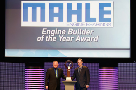 Director of Marketing at MAHLE Aftermarket Inc. Ted Hughes (left) presents Sam Vernatter of Hendrick Engines with the 2015 MAHLE Engine Builder of the Year Award during the 2015 NASCAR NMPA Myers Brothers Awards Luncheon at Encore Las Vegas on Dec. 3, 2015, in Las Vegas. (Photo by Brian Lawdermilk/NASCAR via Getty Images)